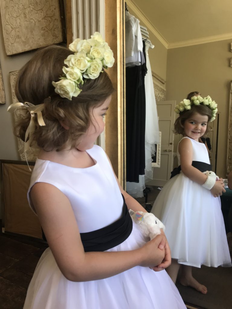 The cutest little flower girl with flower crown